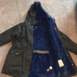 Green winter coat with blue vegan fur lining